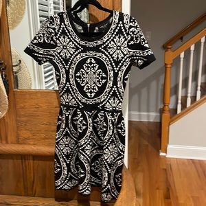 Sweater dress, medium, excellent condition. Short sleeves and zipper in back.